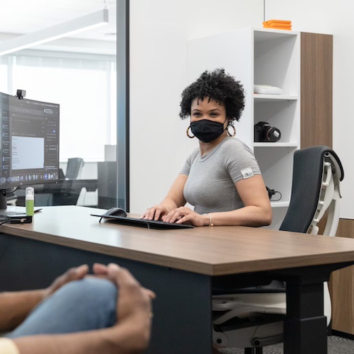 Woman working in tech.