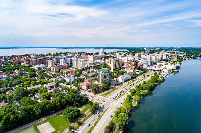 RHB Assets From IGX: Aerial view of Madison, Wisconsin isthmus with lakes on both sides.