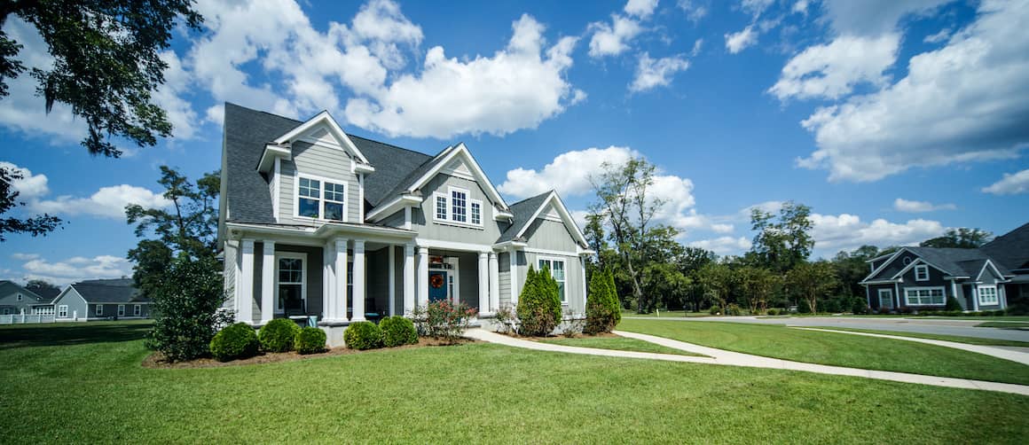 A gray modern cottage home, showcasing modern architectural design.