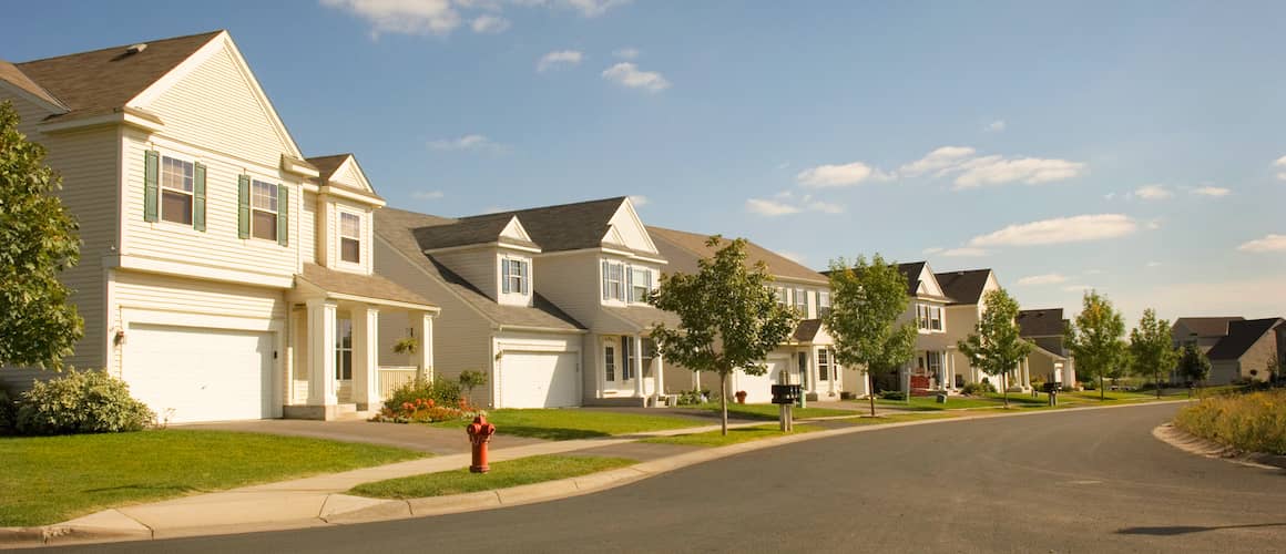 A vibrant image showcasing a community, possibly with people interacting, highlighting the concept of investing in neighborhoods.