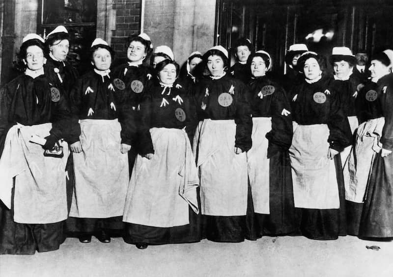 RHB Assets From IGX: A group of suffragettes marching with signs.