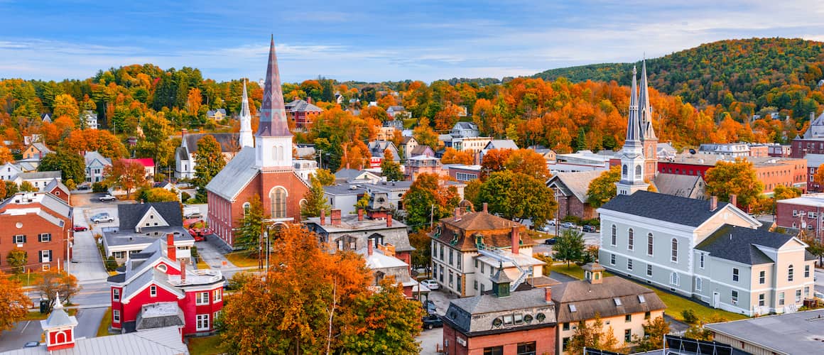 RHB Assets From IGX: Montpelier, Vermont town in fall with trees and homes