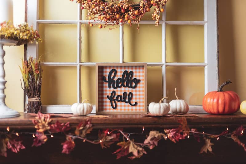 Fall mantel with window frame background