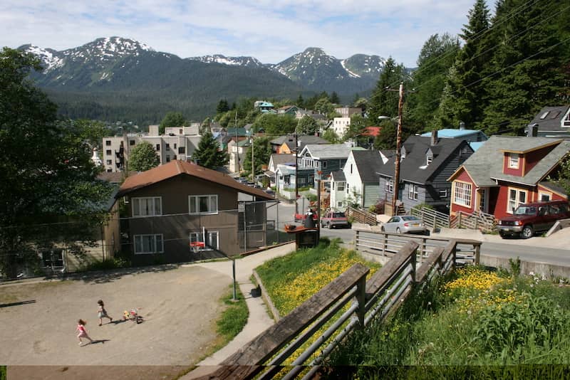 RHB Assets From IGX: Scenic view of Juneau, Alaska with mountains and water.