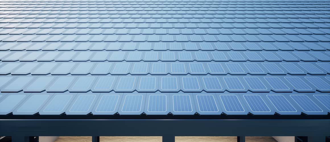 Solar shingles laid over a rooftop.