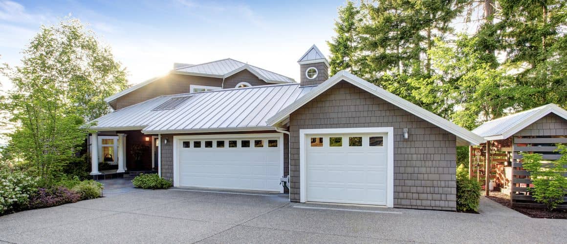 A grey house with curb appeal, representing a house with aesthetic appeal from the curb.