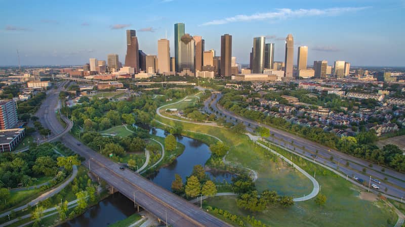 RHB Assets From IGX: Houston skyline during late afternoon with a clear blue sky.