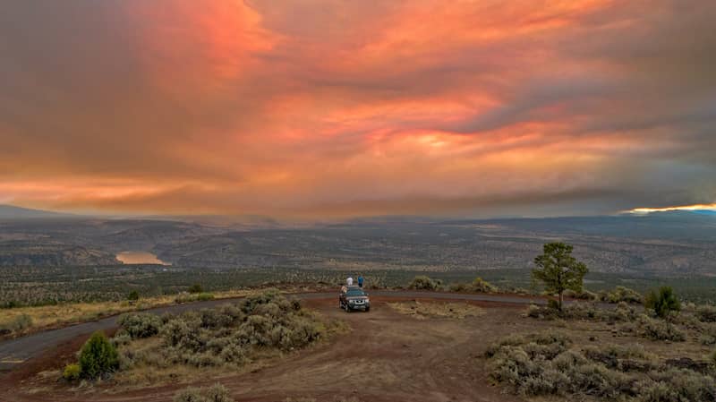 RHB Assets From IGX: Camping in Madras, Oregon, with mountains and a lake