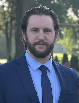 Justyn Patrick Schoening headshot.