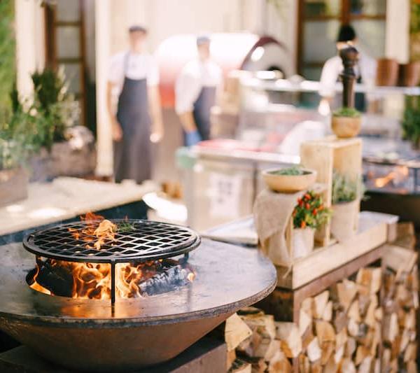 RHB Assets From IGX: Outdoor kitchen with a built-in grill and countertop space.