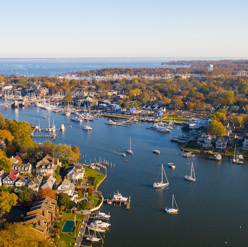 Aerial view of Spa Creek with boats in the water and houses along the water's edge in Annapolis, Maryland.