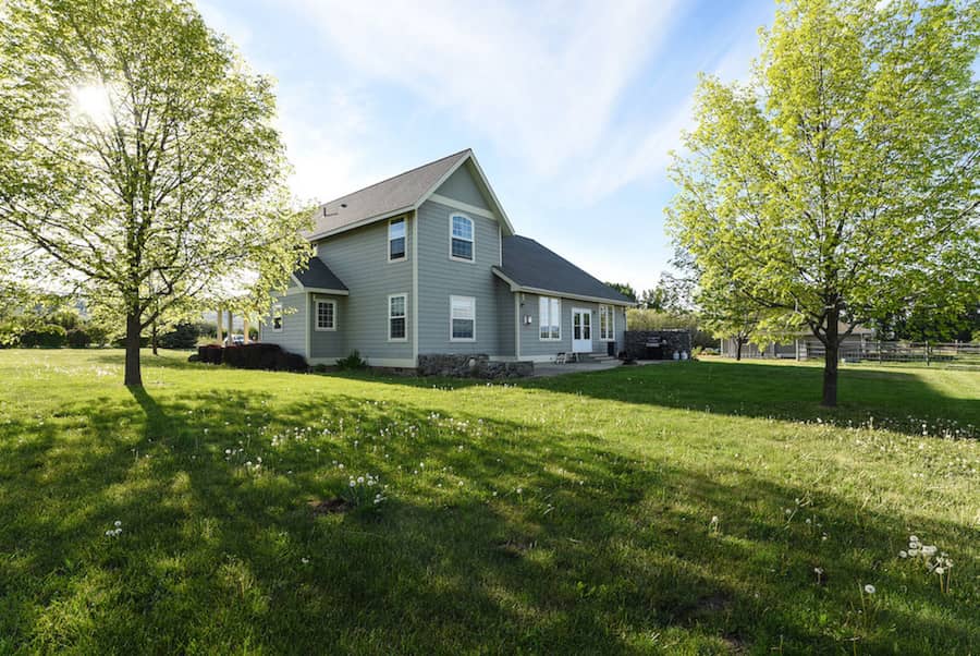 Farmhouse Backyard with Trees