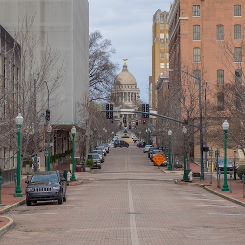 Street in Jackson, Mississippi with the Capitol building in view.