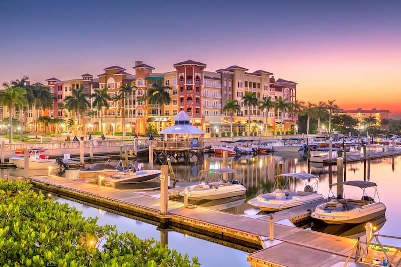 RHB Assets From IGX: Naples, Florida cityscape with palm trees and waterfront