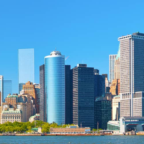 RHB Assets From IGX: A city skyline with solar panels.