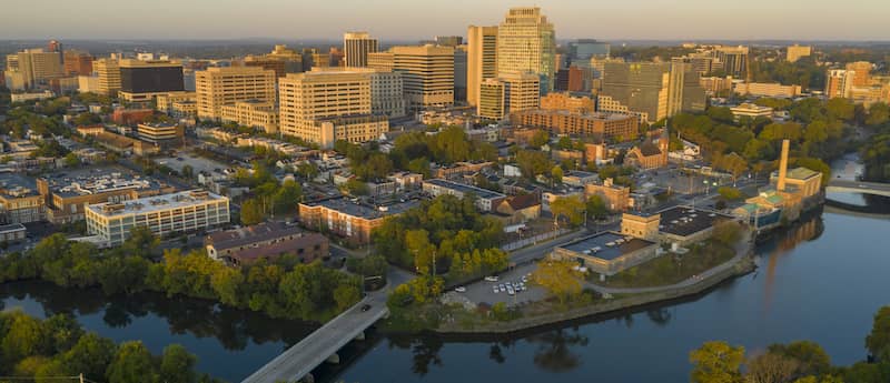 RHB Assets From IGX: Scenic view of the Delaware River flowing through Wilmington at dawn.