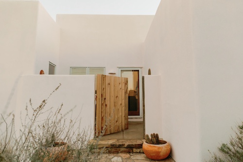 White stuco minimalist style home in Marfa Texas.