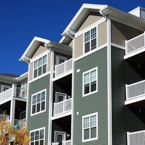 A row of condos, discussing the cost or refinancing options related to condominiums.