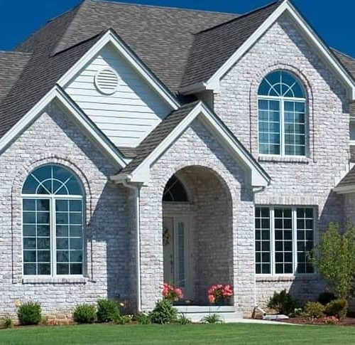 A beautiful brick home, showcasing real estate or homeownership.