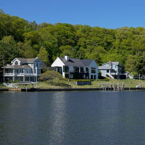 Large homes along the riverfront.