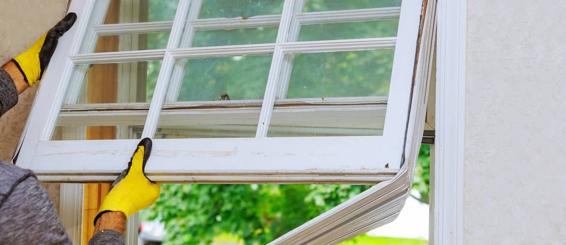 RHB Assets From IGX: A man replacing a window.