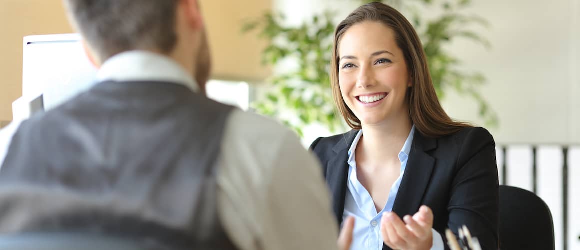 Woman offering personal loan to man.