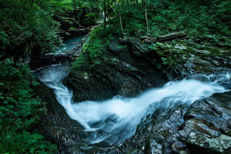 Water rushing through V Slot Canyon Falls in Arkansas.