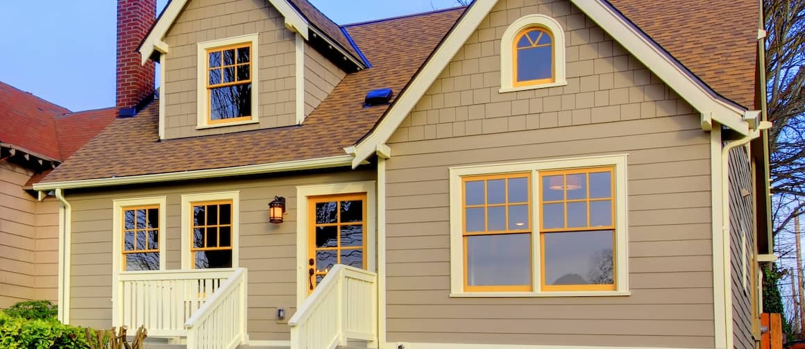 Small brown house with orange trim.