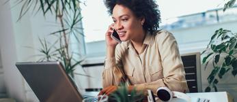 RHB Assets From IGX: Self-employed woman working on her laptop at home