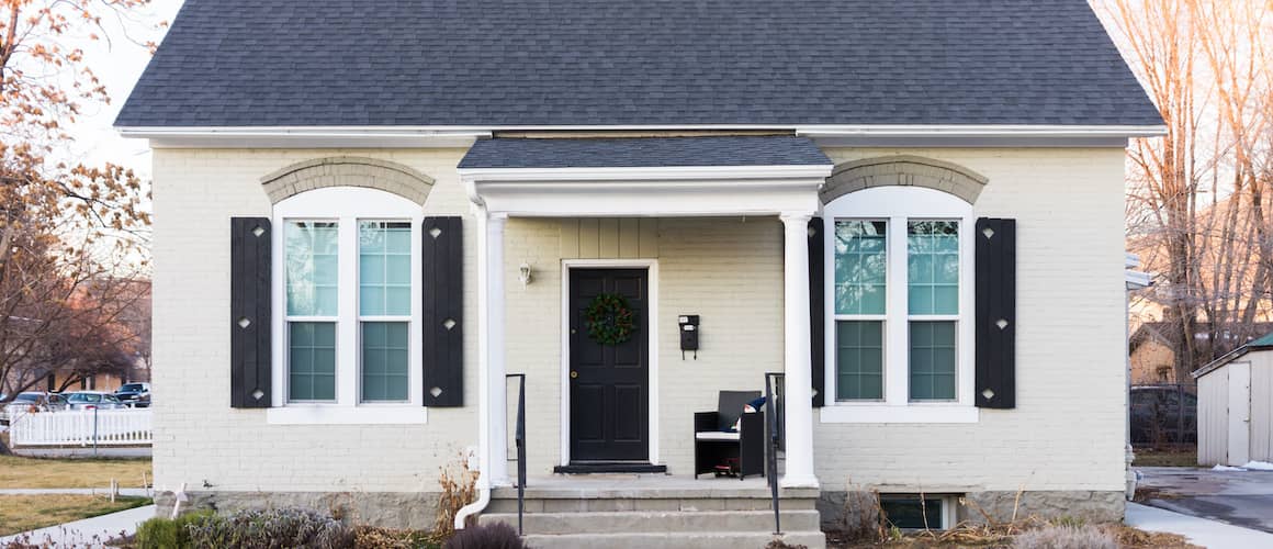 A white brick house, illustrating residential architecture and exterior design.