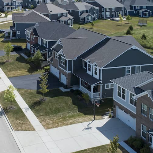 Neighborhood development, possibly illustrating a newly constructed residential area.