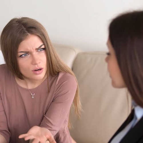 A couple who may have experienced a scam, potentially related to real estate or financial matters.