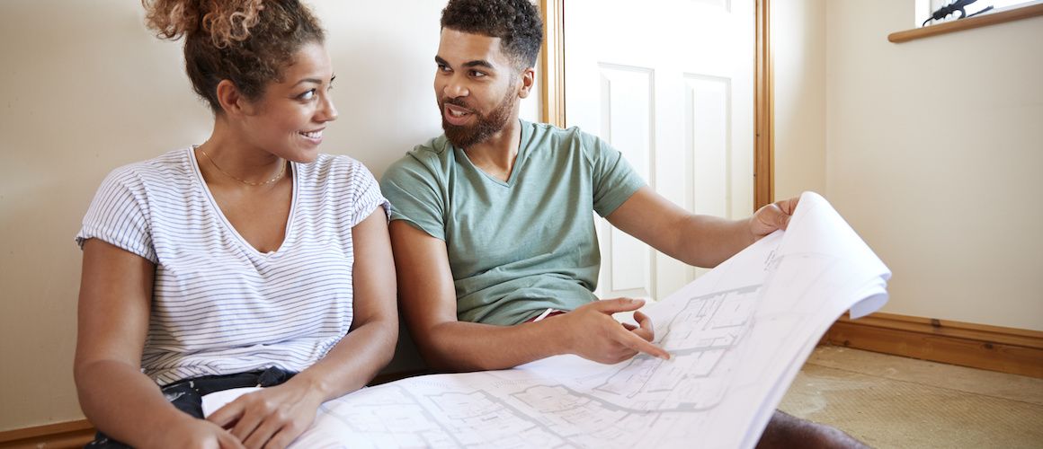 A couple involved in remodeling, possibly related to home improvement or renovations.