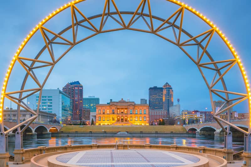 RHB Assets From IGX: Aerial view of Des Moines, Iowa, showcasing a mix of residential and commercial buildings along the river.