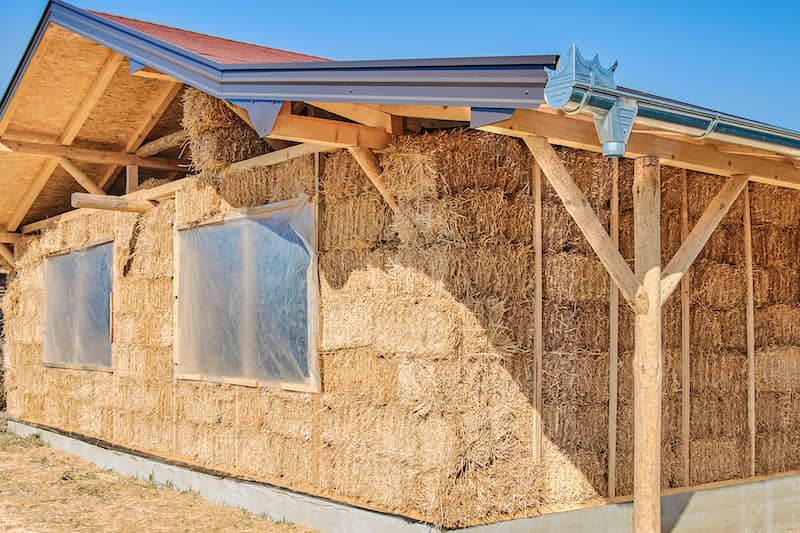 Straw bale home being built.