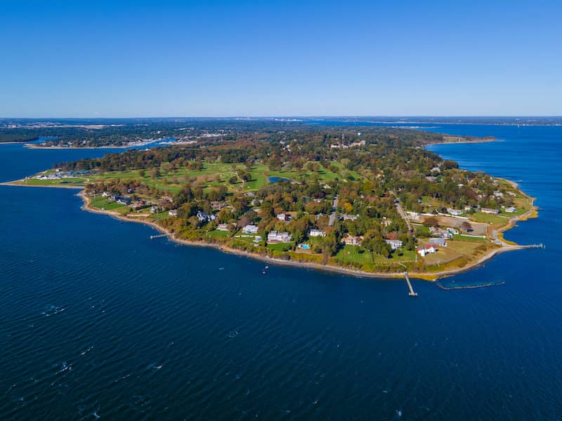 RHB Assets From IGX: Panoramic view of Warwick, Rhode Island, with a waterfront and boats.