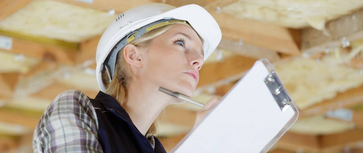 RHB Assets From IGX: A pest inspection technician examining a home.