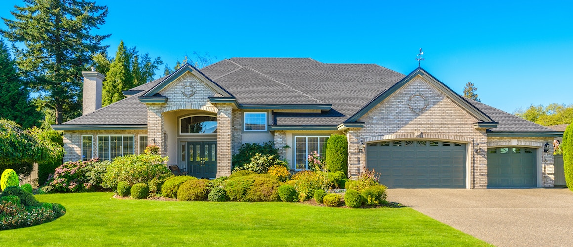 Excited couple celebrating an accepted offer on a house