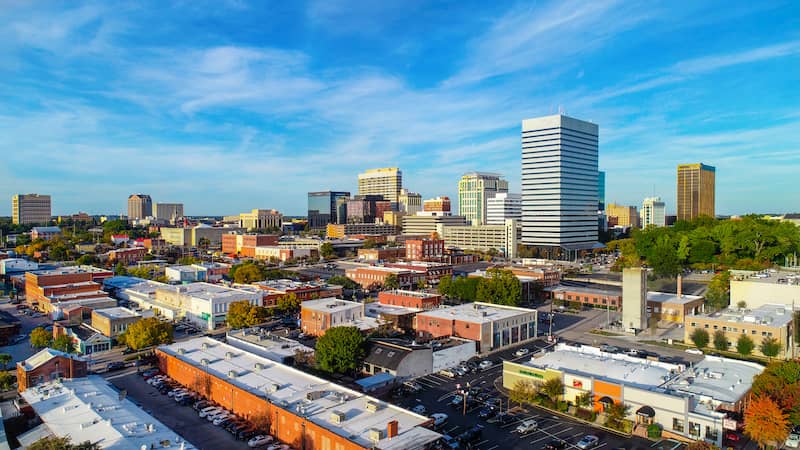 RHB Assets From IGX: Downtown Columbia, South Carolina with tall buildings and a clear blue sky