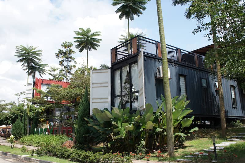 A home made from a refurbished shipping container. Surrounded by beautiful landscape.