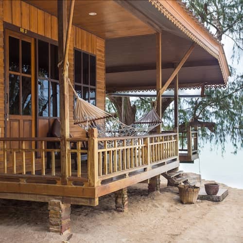 Rustic style seafront beach house with a seaview terrace and hammock.
