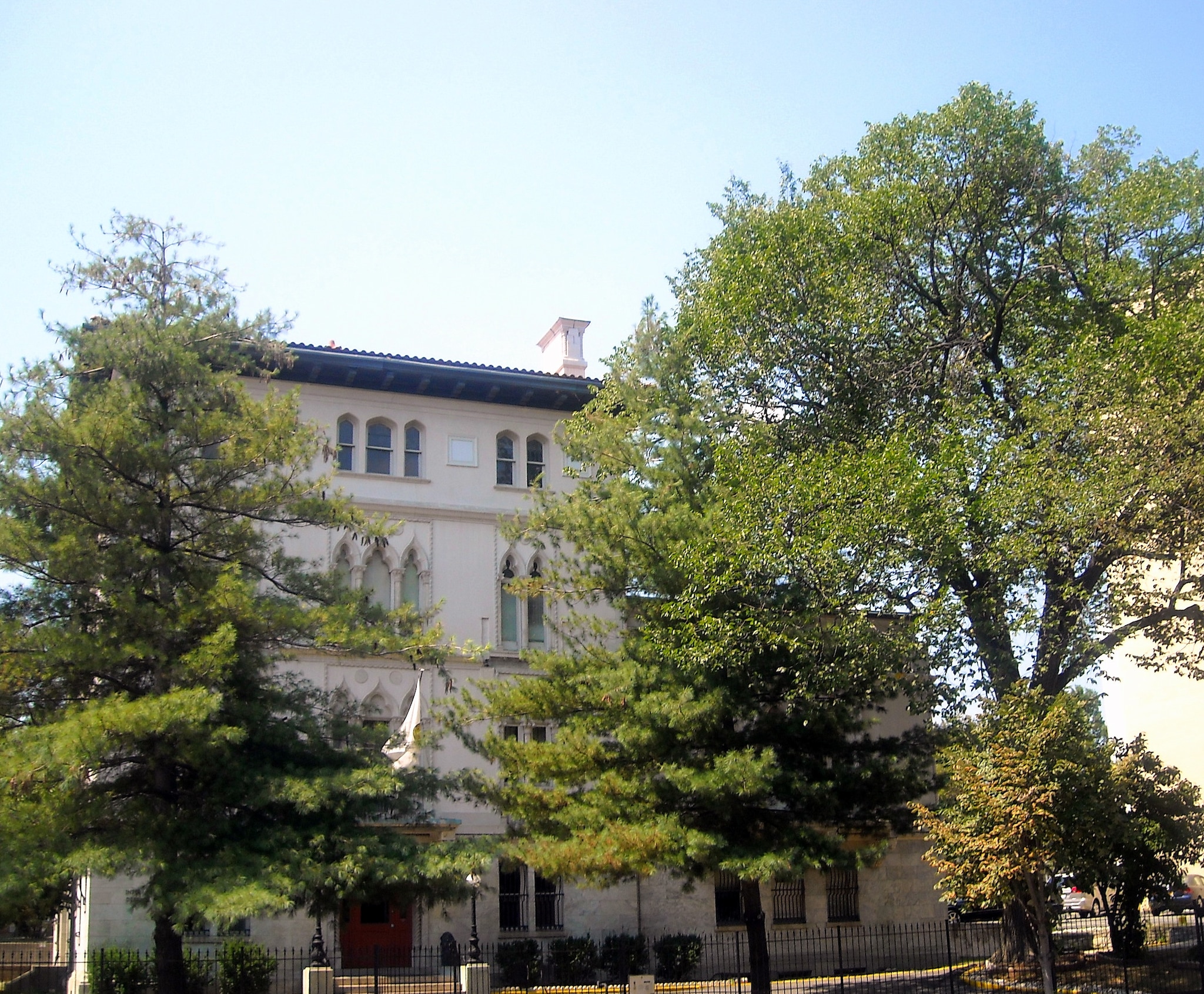 RHB Assets From IGX: Exterior of a unique pink palace-style home in Washington, D.C.