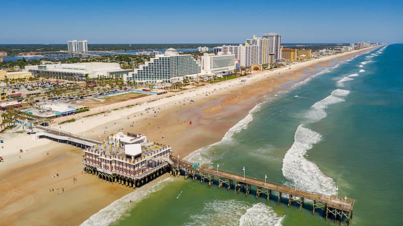 RHB Assets From IGX: Ormond Beach, Florida, featuring a sandy shoreline and palm trees.