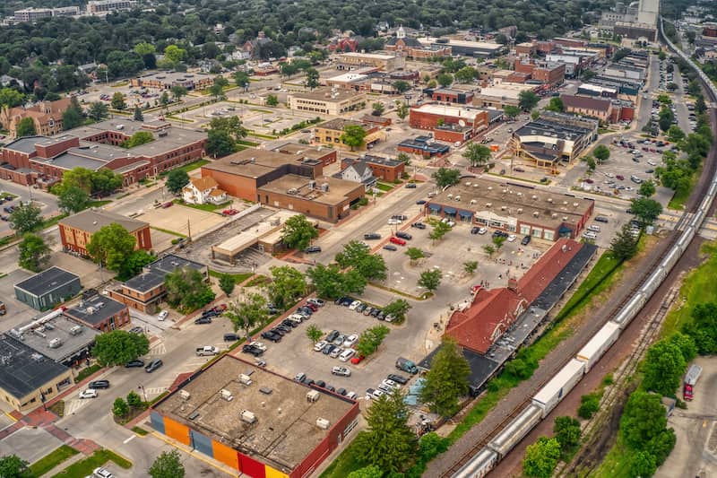 RHB Assets From IGX: Aerial view of Ames, Iowa, showcasing a residential area and greenery.