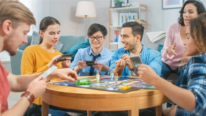 RHB Assets From IGX: Friends playing a board game