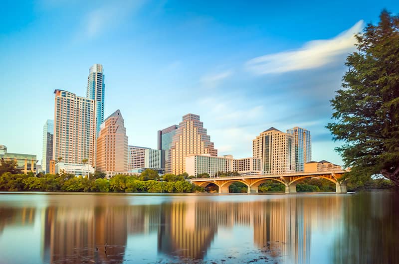 RHB Assets From IGX: A vibrant cityscape of Austin, Texas with skyscrapers and a lively atmosphere.