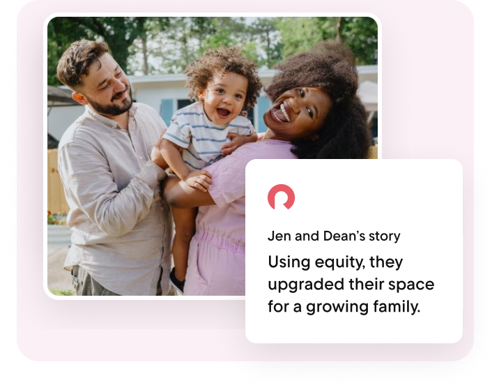 Couple holding a smiling child outdoors in front of their home