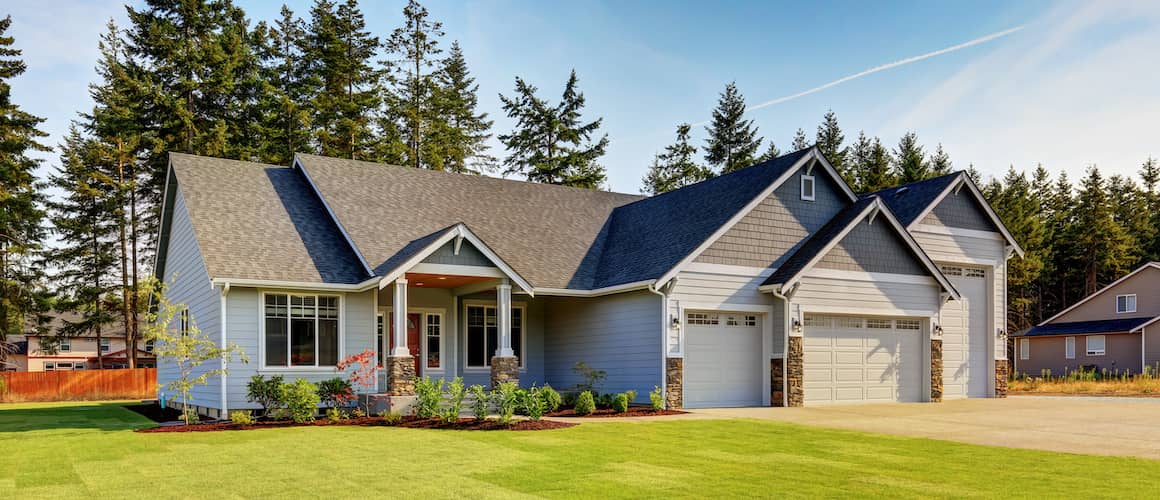 RHB Assets From IGX: A house in Alabama with a brick exterior and a porch with a swing.