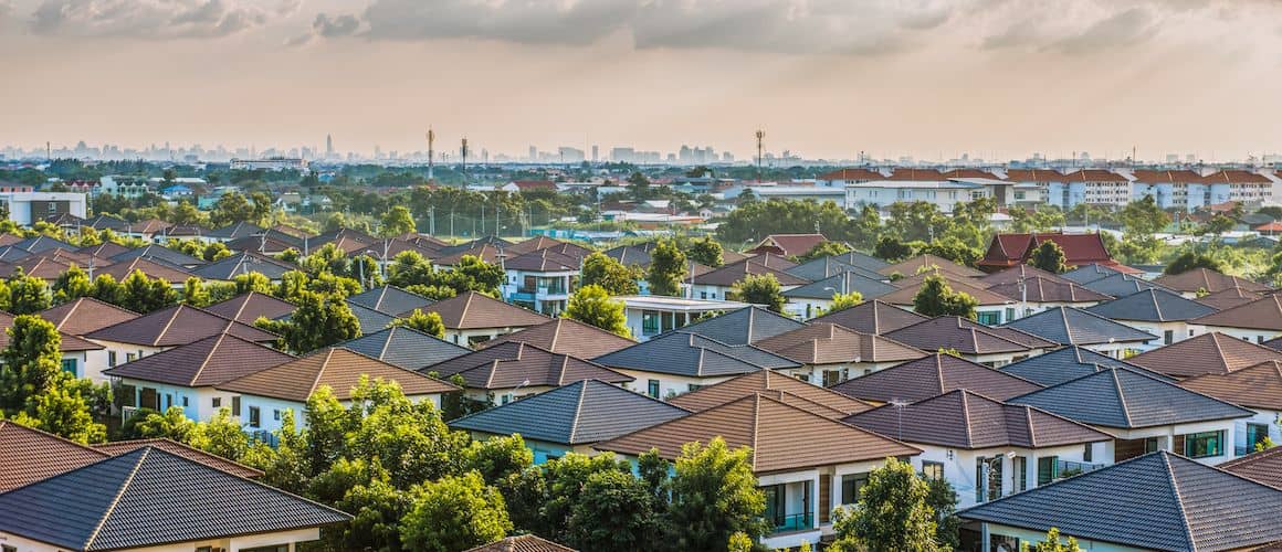 Rooftops in a neighborhood, portraying a community or residential area.