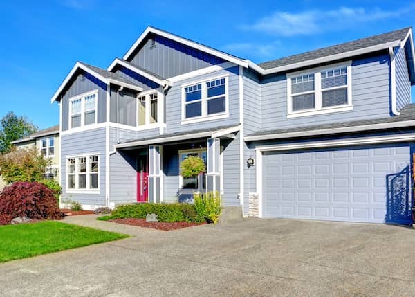 Two story home with extra room above garage.